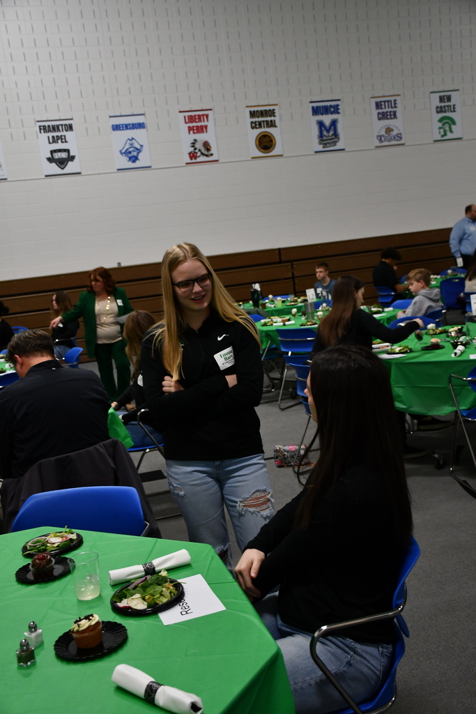 Student building relationship with community member