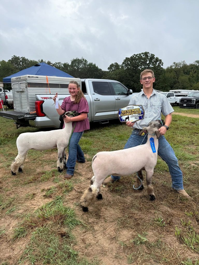 New Diana FFA students posing with their award winning sheep.