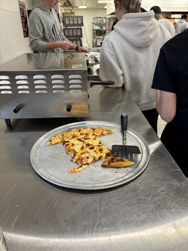Mrs. Schmitt said that she had two sections of Foods II this semester that were full with 24 students in each class! The first unit we learned about Vegetarian foods. The students said, "Uugh, we don't want to eat vegetarian food!" After our labs the comments were, "Hey, this tasted pretty good. I like this!" Many vegetarian dishes were made: pizza, mac & cheese from scratch, salads, quesadillas, ranch-veggie roll up, vegetarian lasagna, grilled cheese sandwiches, fettuccine alfredo; just to name a few. 