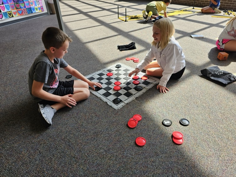 5th and 6th graders enjoying some of the new activities in the foyer during their Recess & Reteaching time. 