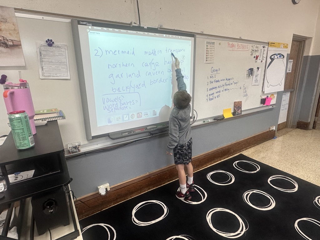 4th grade students are working on identifying the vowel sounds in words to determine how many sounds a word has.