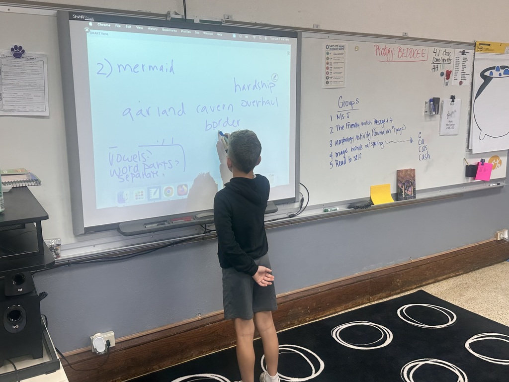 4th grade students are working on identifying the vowel sounds in words to determine how many sounds a word has.