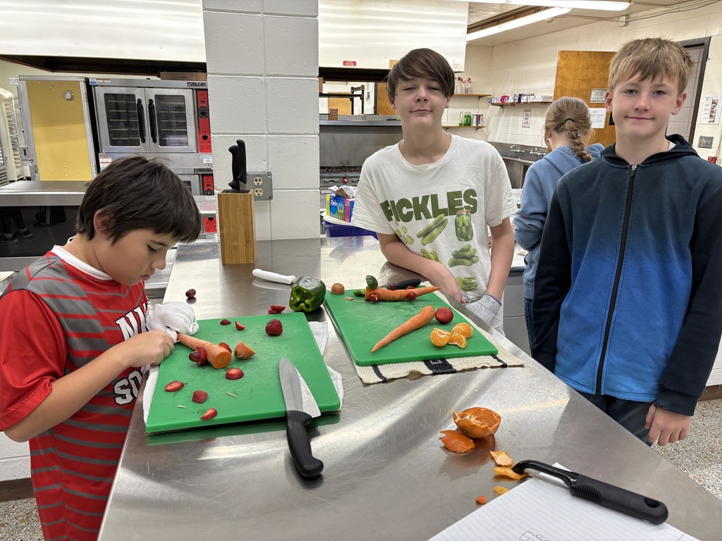 Day Two 7th Grade FCS (Family & Consumer Science) students had a fun learning experience making veggies cars. They practiced their knife skills and were very creative.