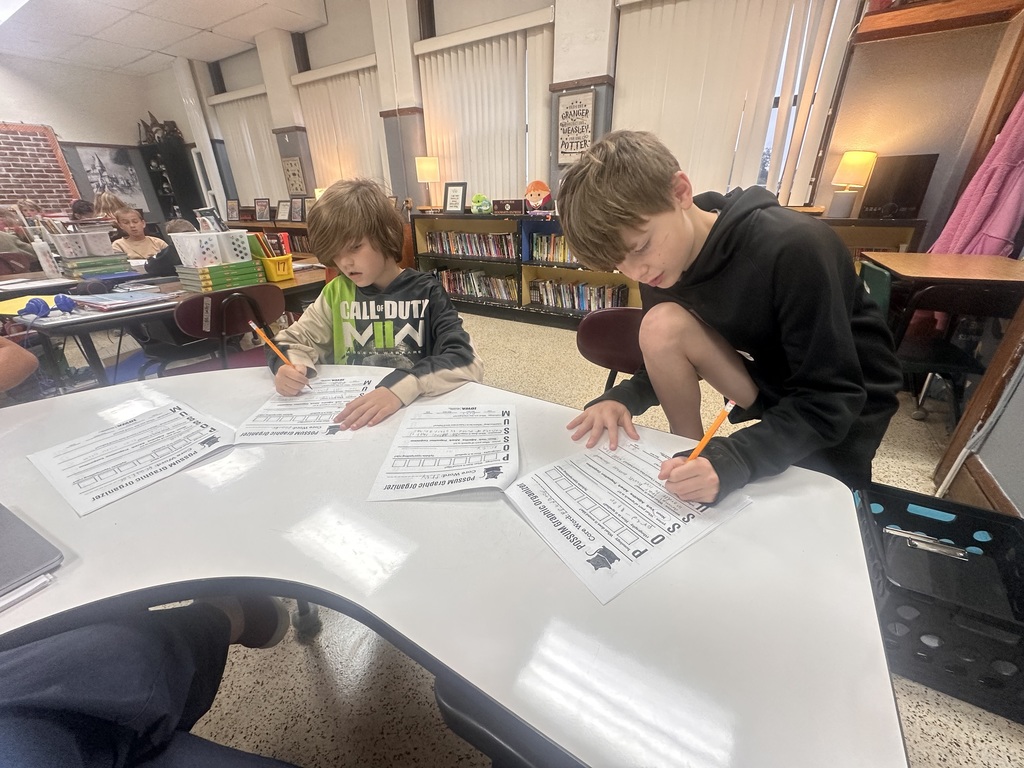 4th graders are studying vocabulary words with a new strategy they learned.