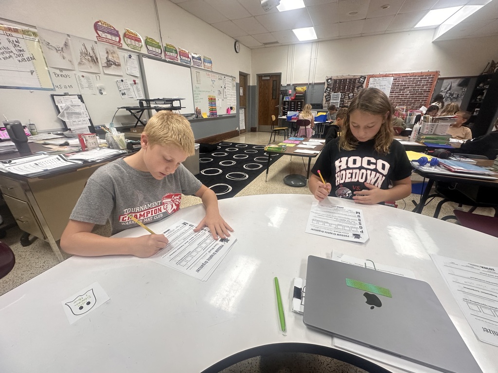 4th graders are studying vocabulary words with a new strategy they learned.
