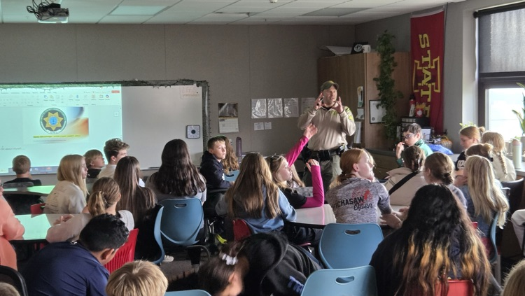 Chris Schveiger from the Fayette County Sheriff's Department came to speak to our 7th and 8th grade students for Red Ribbon Week.