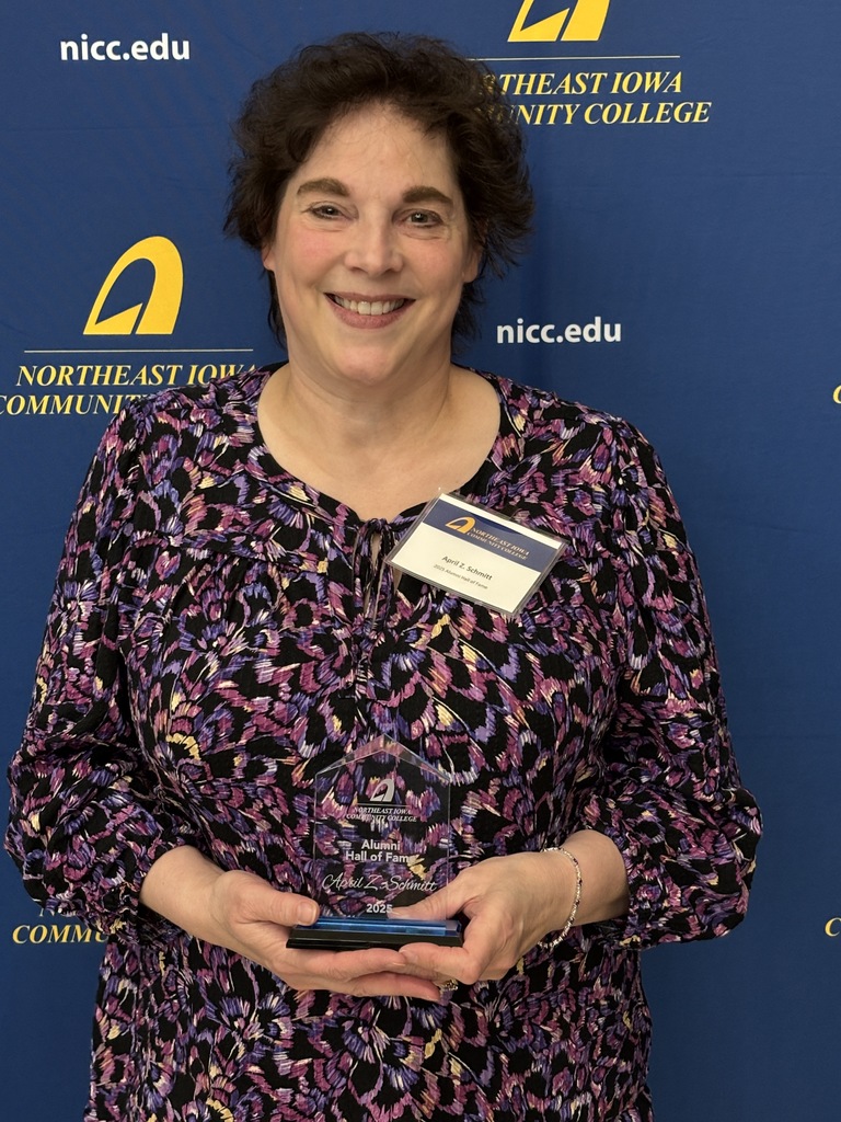Our very own was honored on Thursday, October 23rd at Northeast Iowa Community College (NICC) in Calmar. Mrs. April Schmitt (New Hampton's Family & Consumer Science Teacher) was inducted into the NICC Hall of Fame with a banquet, presentations, awards, and speeches. "It was quite the evening! I was fussed over and made to feel like a queen." said Schmitt. Schmitt started her academic journey at NICC and then went to Luther College (Bachelor's Degree), Viterbo University (Master's Degree), and ISU (FCS Endorsement). Schmitt's final words in her speech were, "Invest in our students; because they will change the world." 