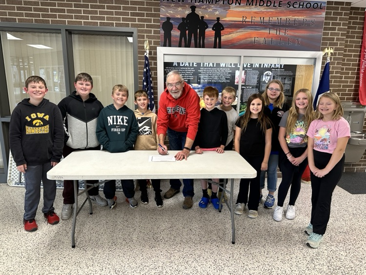 Mayor Geerts visited New Hampton Middle School to sign the American Education Week proclamation as students looked on.