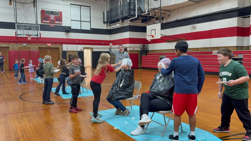 We are excited to share the results of our Elementary school-wide canned food drive! As a school, our goal was to collect 2,000 cans… and thanks to your generosity, we collected an amazing 2,448 cans! Be sure to see Mrs. Steele strut her stuff dressed like a turkey today!  Thank you to every student and staff member who helped make a difference for families in our community.  Now for the class results! These teachers will be pied in the face later this morning!:  Ms. Harper’s class: 125 cans   Ms. Paulus’s class: 192 cans   Ms. Treichel’s class: 195 cans   Mrs. Heeren’s class: 101 cans   Ms. Kleepsies’s class: 132 cans   Mrs. Throndson’s class: 177 cans   🎉 Way to go to all of our winning grade-level classes! 🎉 Your hard work and generosity truly made this food drive a success.  Thank you again to everyone who donated. Let’s keep showing kindness and making our school proud!