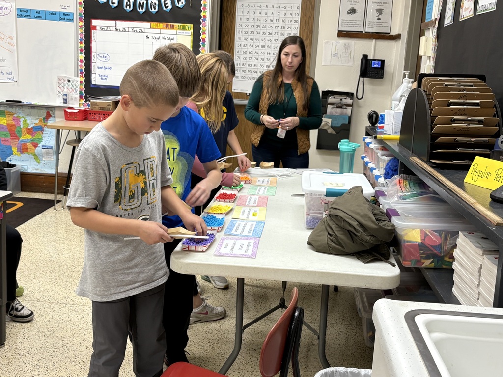 New Hampton's fourth graders enjoyed learning about nutrition using a hands-on lesson presented by Jessica Rochford, Ag in the Classroom.  Each student made a nutrition bracelet to represent the daily servings needed for a balanced diet.  The students also identified the different food groups using examples of school lunches.  Thank you, Jessica, for the fun activity.
