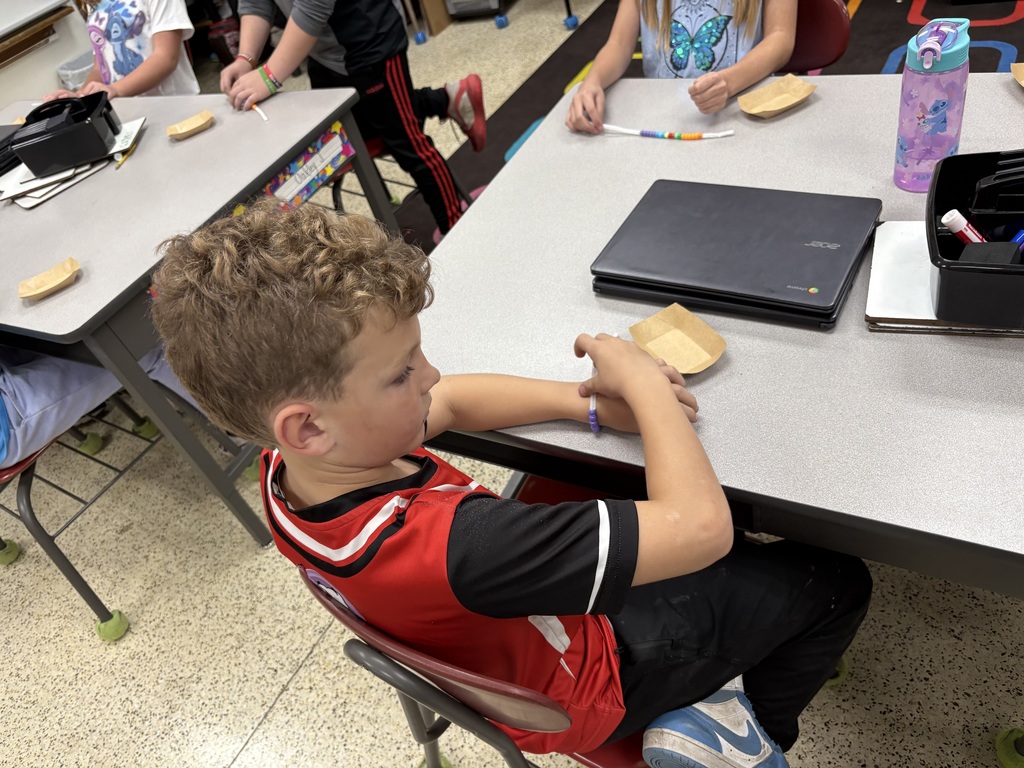 New Hampton's fourth graders enjoyed learning about nutrition using a hands-on lesson presented by Jessica Rochford, Ag in the Classroom.  Each student made a nutrition bracelet to represent the daily servings needed for a balanced diet.  The students also identified the different food groups using examples of school lunches.  Thank you, Jessica, for the fun activity.