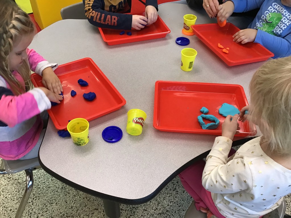 Our three year old preschool students love play dough activities! Not only does using play dough develop students' fine motor skills by strengthening their finger muscles and increasing their hand eye coordination, it also gives tons of opportunities for creativity! From forming letters to making feeling faces to creating their own Thanksgiving or Christmas decoration, the possibilities are endless. 