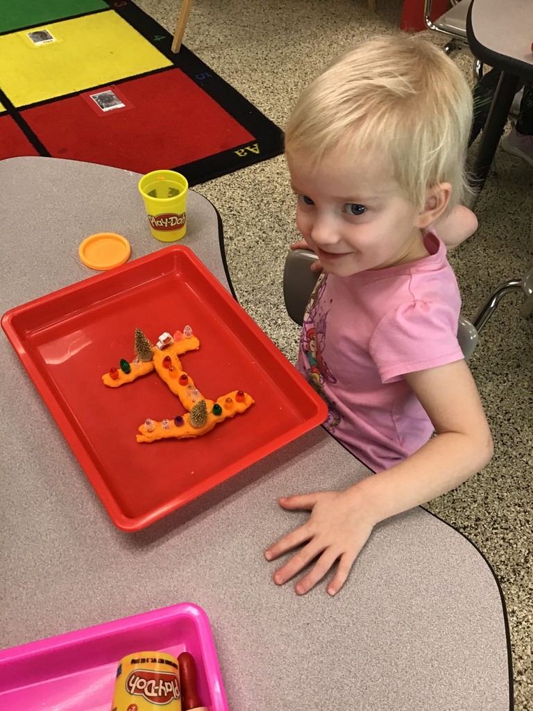 Our three year old preschool students love play dough activities! Not only does using play dough develop students' fine motor skills by strengthening their finger muscles and increasing their hand eye coordination, it also gives tons of opportunities for creativity! From forming letters to making feeling faces to creating their own Thanksgiving or Christmas decoration, the possibilities are endless. 