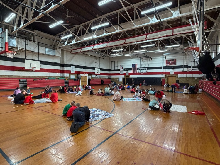 The Third Graders and their families made tie blankets for Project Linus.