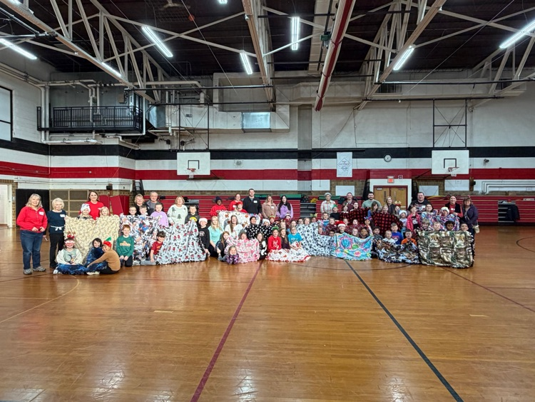 The Third Graders and their families made The Third Graders and their families made tie blankets for Project Linus. tie blankets for Project Linus.