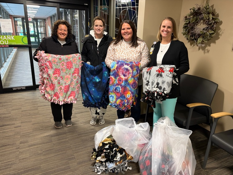 The Third Graders and their families made tie blankets for Project Linus.