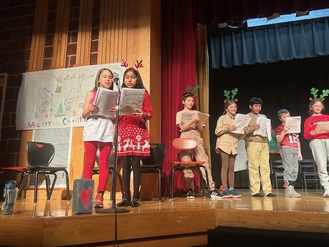 On December 22, Mrs. Throndson’s homeroom performed a readers’ theater for fellow 4th graders and their families. The kids knocked it out of the park! 