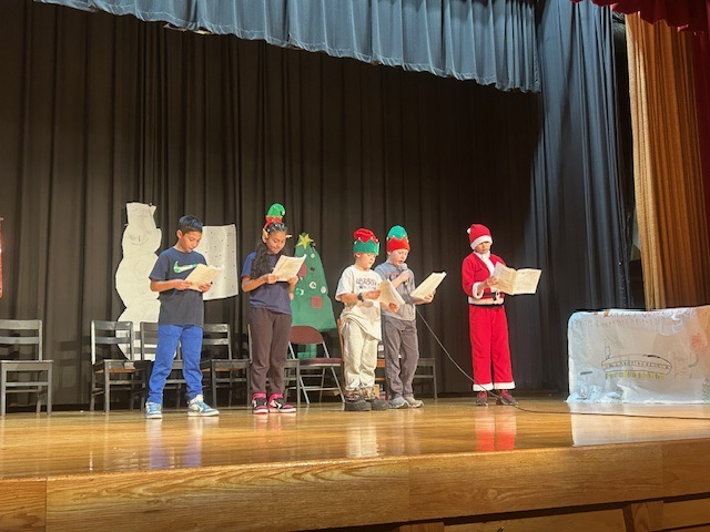 On December 22, Mrs. Throndson’s homeroom performed a readers’ theater for fellow 4th graders and their families. The kids knocked it out of the park! 