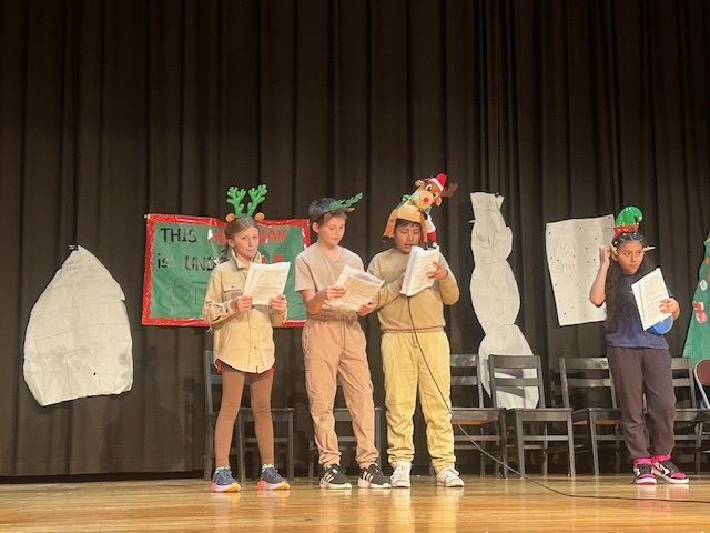 On December 22, Mrs. Throndson’s homeroom performed a readers’ theater for fellow 4th graders and their families. The kids knocked it out of the park! m