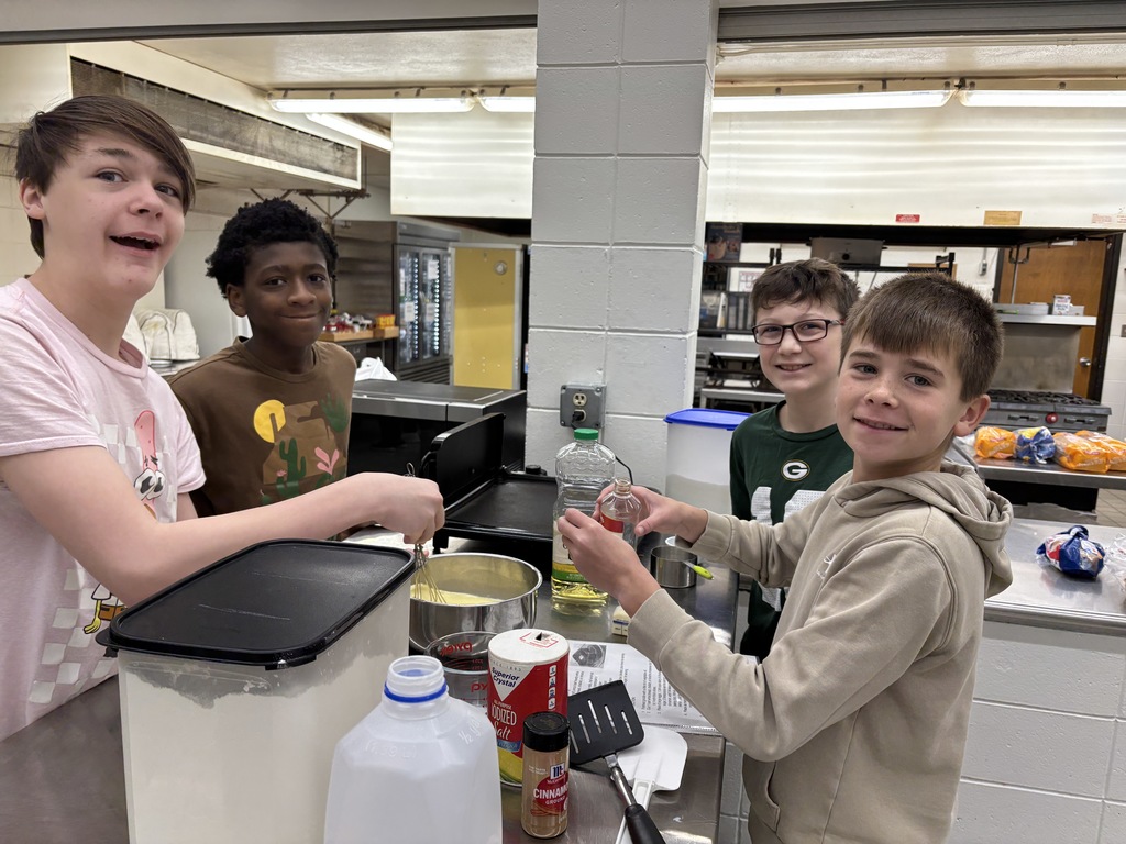 7th Grade FCS was busy with their last lab of the semester making French Toast. They stuffed themselves with golden French toast dripping with syrup. I tried not to help very much to see what they have learned doing labs this semester. They did a great job! 