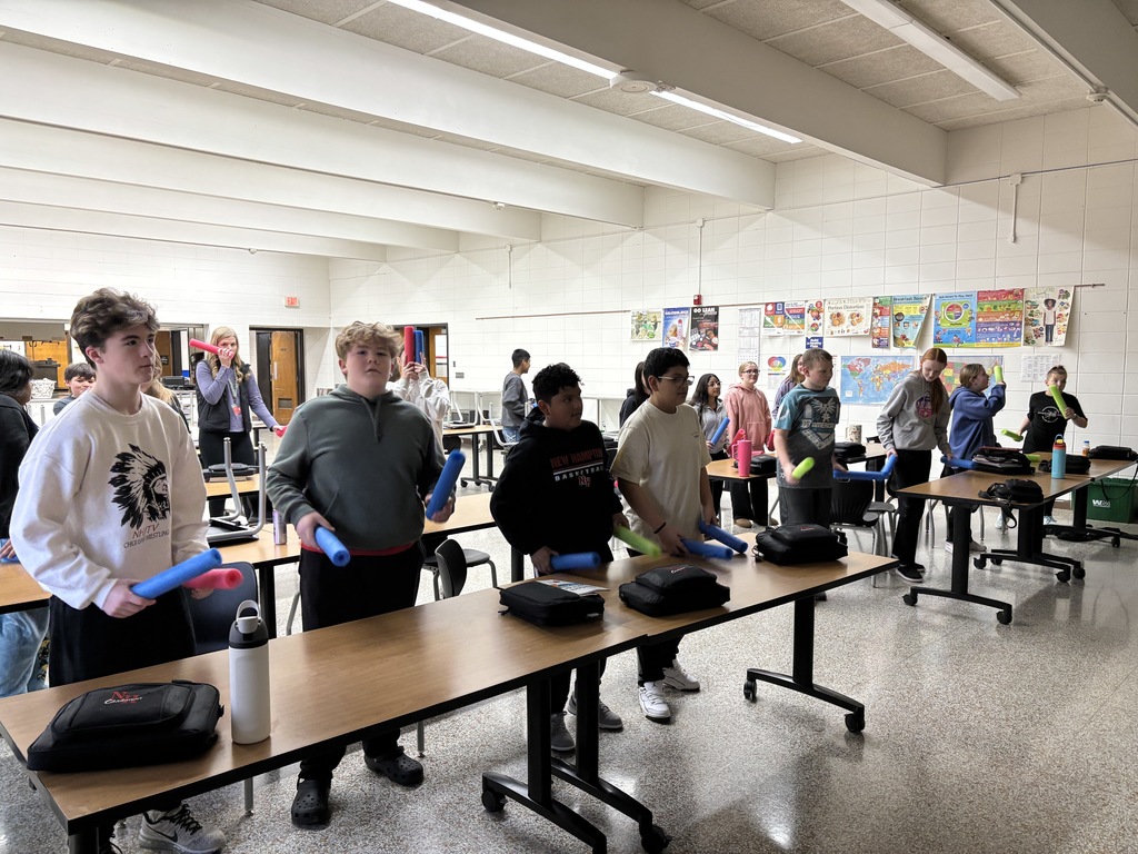 Being healthy is more than just eating nutritious food. The 7th grade FCS class enjoyed doing "Cardio Desk Drumming" with pool noodles and some rock'in music videos from a P.E. teacher. Also the students were laughing and having fun. Another important part to a healthy lifestyle. (the lights were off, so the pictures are a little dark.)