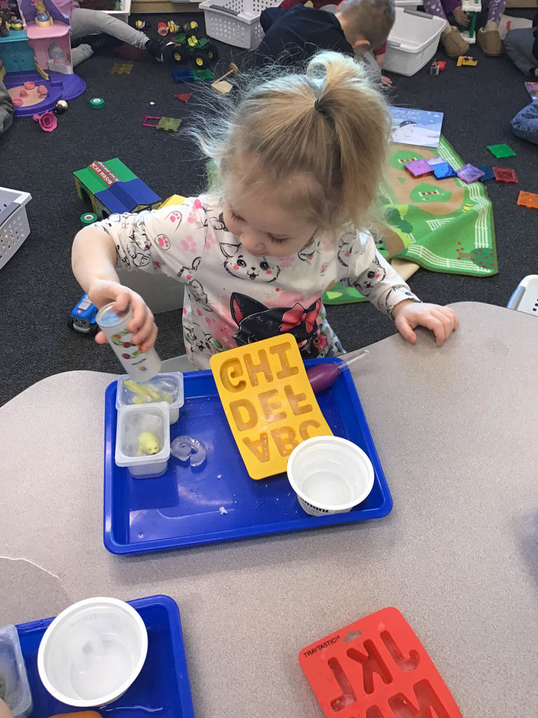 It may have been too cold to play outside in January, but these preschoolers found plenty of ways to play with "snow" and "ice" inside! 