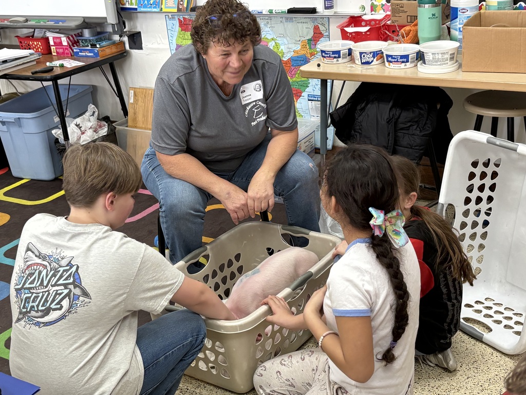 The fourth-grade classes were visited by Joanne Tupper, our Ag. Partner in Education. She provided information about their pork operation and described how math is used on a daily basis. They learned about the different types of meat that we can get from pigs. She also brought two piglets for the students to pet.