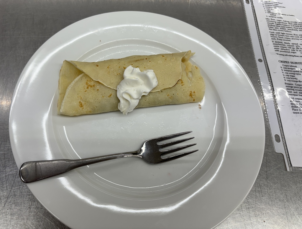 Here are some of the pictures of the students making crêpes. Crêpes are pronounced "krep," rhyming with "step." English people commonly mispronounce it. Thank you, Mrs. Glenn for telling Mrs. Schmitt's students this. They topped it off with fresh fruit, Nutella, and whipped cream. Ooh, la, la! 