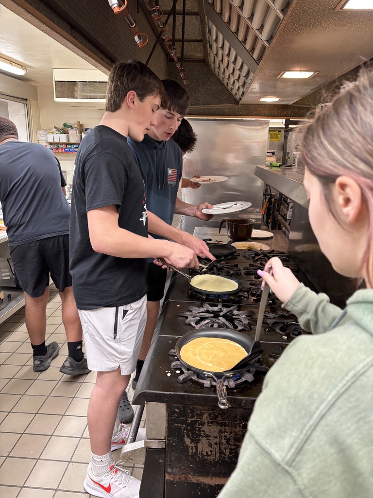 Here are some of the pictures of the students making crêpes. Crêpes are pronounced "krep," rhyming with "step." English people commonly mispronounce it. Thank you, Mrs. Glenn for telling Mrs. Schmitt's students this. They topped it off with fresh fruit, Nutella, and whipped cream. Ooh, la, la! 