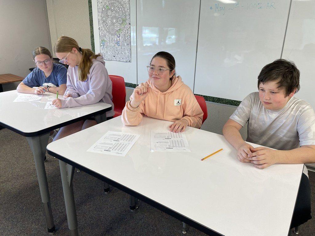 7th grade intervention groups teamed up to take on some fun rounds of Wordle together!