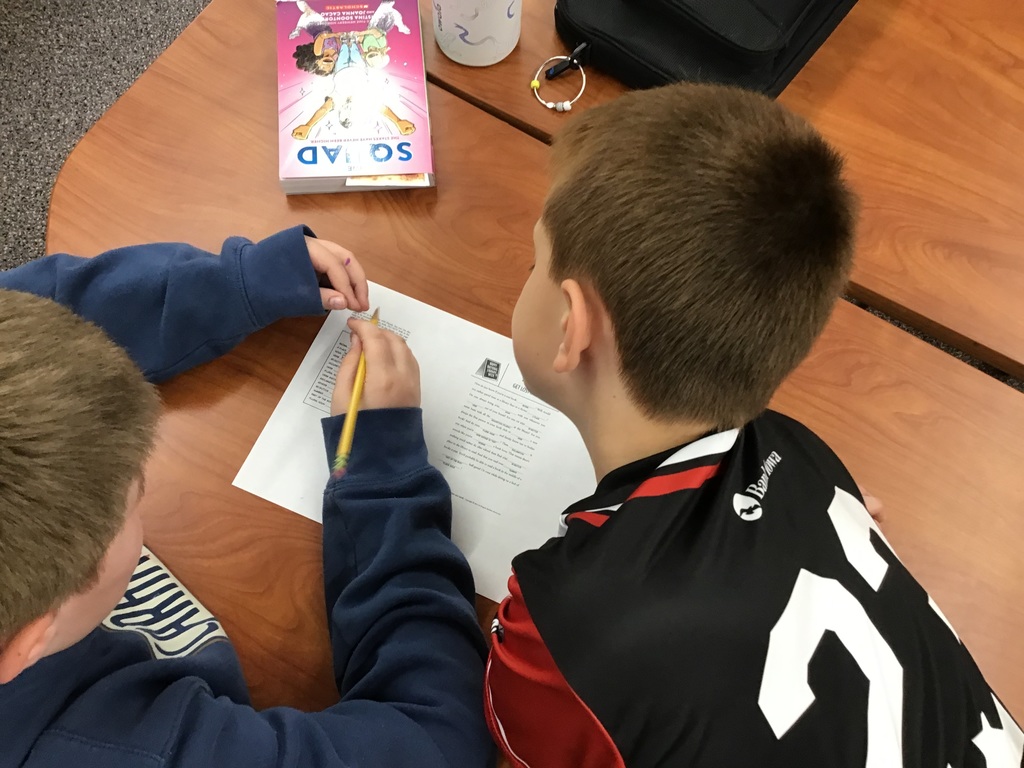 5th grade library intervention practicing parts of speech by playing library themed Mad Libs