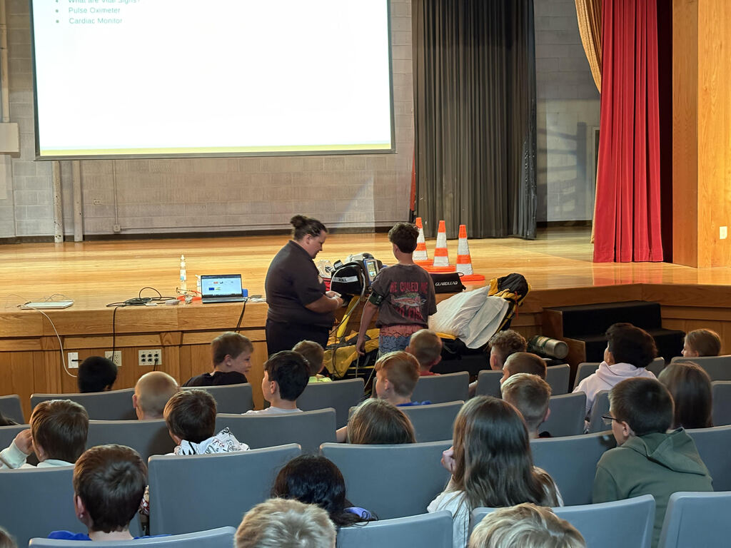 In honor of EMS Week, Sam Streeter and Brannon Anderson visited with students to teach them about Emergency Medical Services (EMS) and the vital role EMS professionals play in public safety. They discussed what EMS does, how first responders help people during emergencies, and the important ways they serve and care for our community.