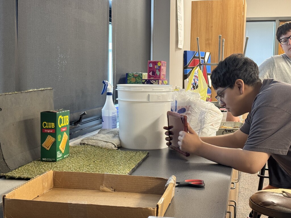 8th grade students in Mr Rude’s intervention group are examining how to photograph food to make it look the most appealing! Learning skills like this translate to marketable skills when they graduate. As you can see, the students improved the quality of the picture through the use of light and positioning.