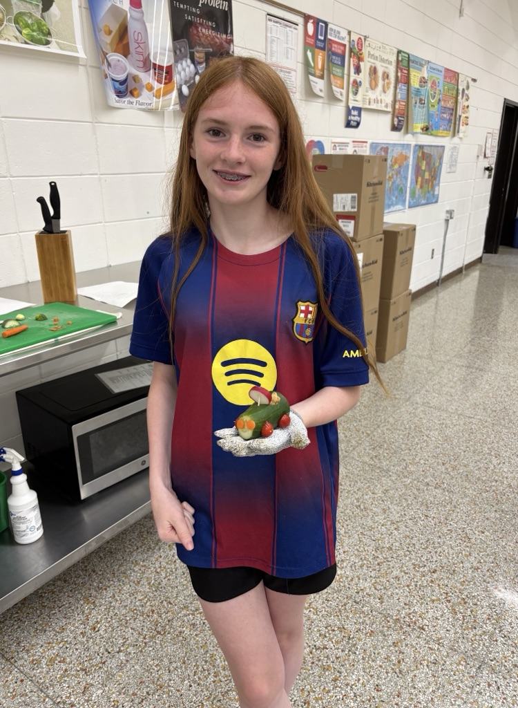 7th grade FCS (Family & Consumer Science) students honed their knife skills by making Veggie Cars. All 40 students (in two sections) safely made a vehicle. You can see by their smiles how proud they were of their success. 