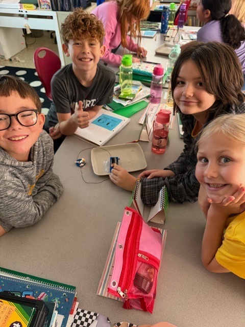 4th graders got the chance to bring working with circuits. Students have been learning about the different types of energy. Yesterday, they had the chance to start working with circuits. They had to make a closed circuit with 1 battery, 2 wires, and a light bulb!