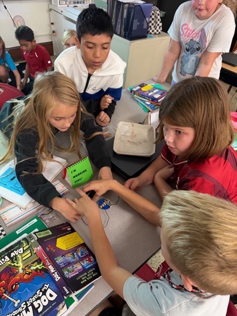 4th graders got the chance to bring working with circuits. Students have been learning about the different types of energy. Yesterday, they had the chance to start working with circuits. They had to make a closed circuit with 1 battery, 2 wires, and a light bulb!