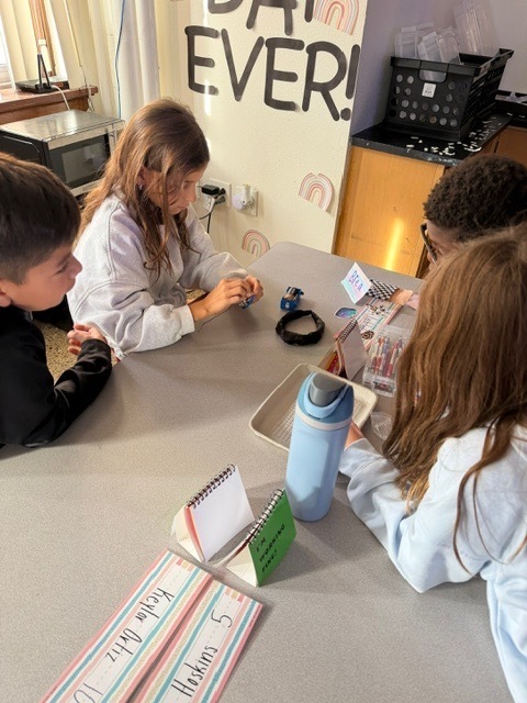 4th graders got the chance to bring working with circuits. Students have been learning about the different types of energy. Yesterday, they had the chance to start working with circuits. They had to make a closed circuit with 1 battery, 2 wires, and a light bulb!