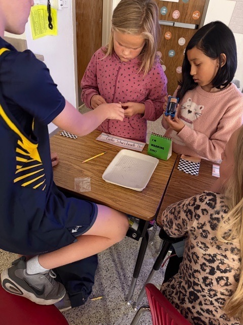 4th graders got the chance to bring working with circuits. Students have been learning about the different types of energy. Yesterday, they had the chance to start working with circuits. They had to make a closed circuit with 1 battery, 2 wires, and a light bulb!