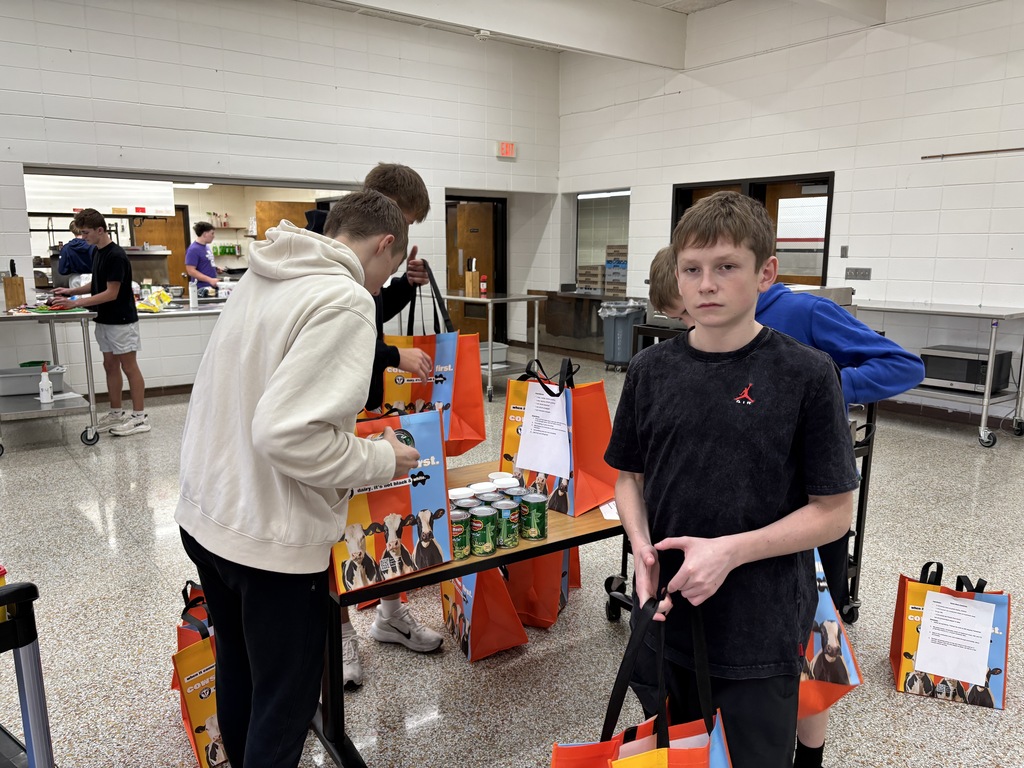 Mrs. Schmitt's Advanced Foods class teamed up with the New Hampton High School Interact Club to create "Recipes in a Bag" as part of a Project-Based Learning (PBL) initiative. To help combat rising grocery prices and local food insecurity, students assembled bags containing all the ingredients needed for two delicious recipes: Green Bean Casserole and Microwave Fruit Salad. Each bag features the recipe on the outside and all required ingredients inside. These recipe bags will be available in the school's food pantry ahead of Thanksgiving!
