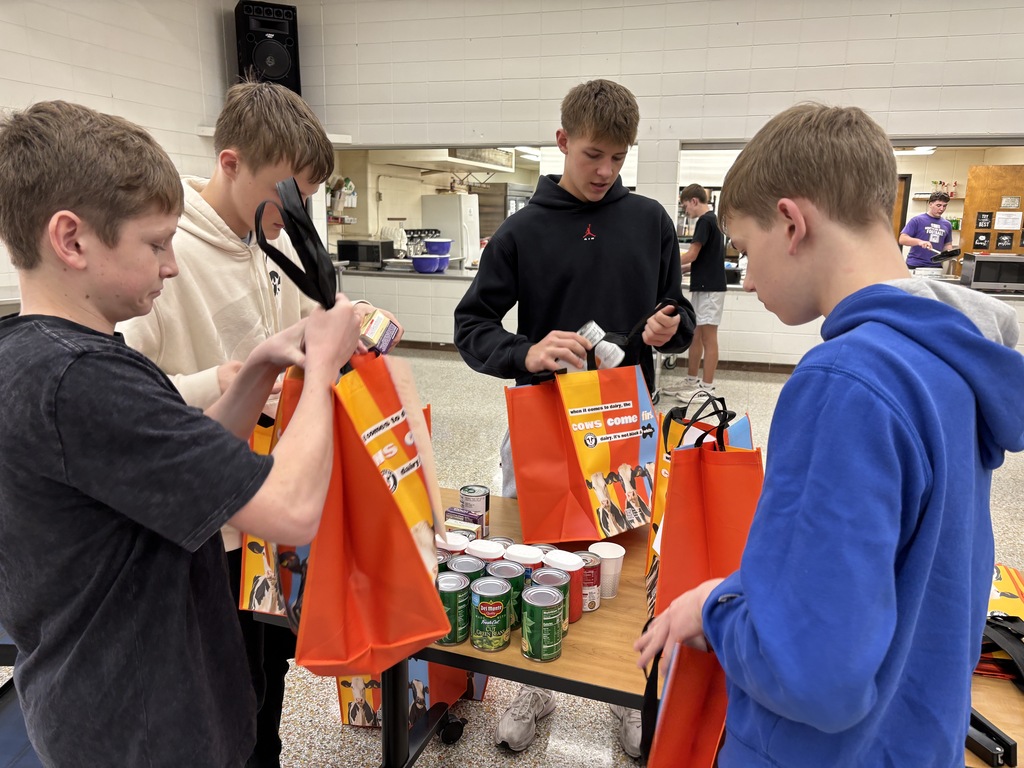 Mrs. Schmitt's Advanced Foods class teamed up with the New Hampton High School Interact Club to create "Recipes in a Bag" as part of a Project-Based Learning (PBL) initiative. To help combat rising grocery prices and local food insecurity, students assembled bags containing all the ingredients needed for two delicious recipes: Green Bean Casserole and Microwave Fruit Salad. Each bag features the recipe on the outside and all required ingredients inside. These recipe bags will be available in the school's food pantry ahead of Thanksgiving!
