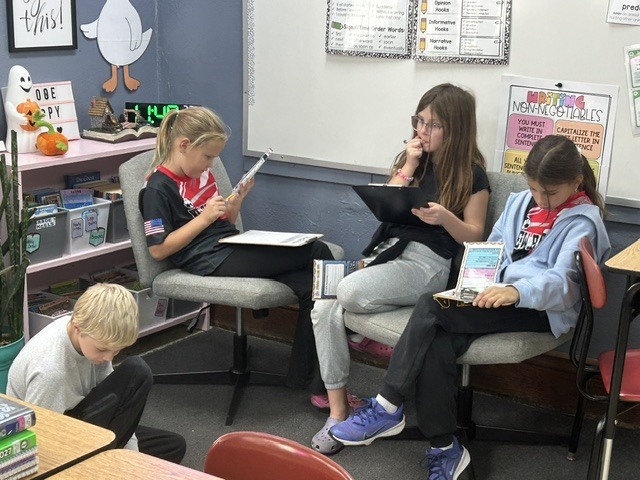 The 4th graders have been putting their inference skills to the test in literacy! Students read clues, used their background knowledge, and made inferences to figure out where a person lives and what costume they are wearing for Halloween. 🏡🦇   They had to look beyond what the clues said and use their detective skills to figure out what they could infer! 🔎🧠   The students are learning that good readers don’t just read the words—they think about the clues and put the pieces together! 📚✨   #FourthGradeLiteracy #MakingInferences #ReadingDetectives #LearningIsFun