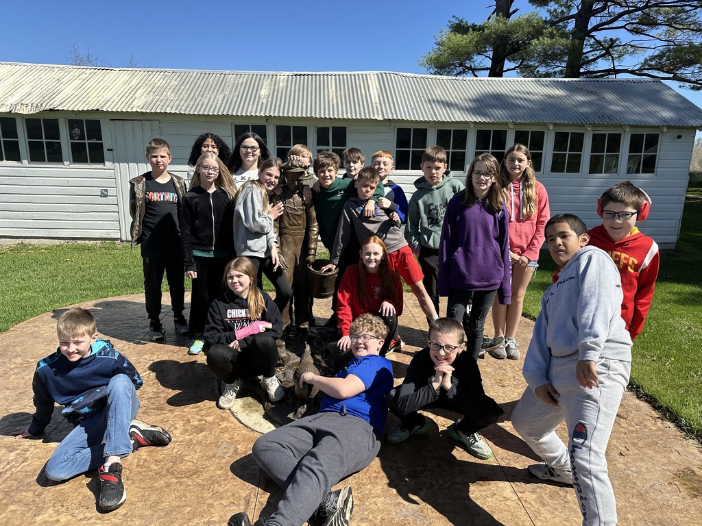 5th graders enjoying the beautiful day at the Norman Bourlag farm. 