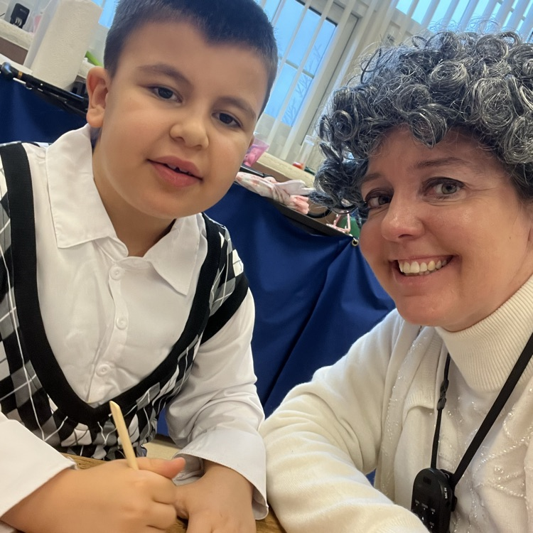teacher and student dress as 100 year old