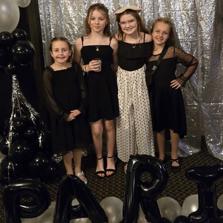 students by balloons