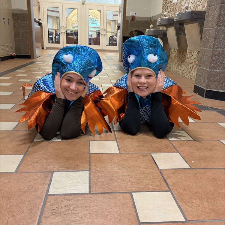staff dressed as fish