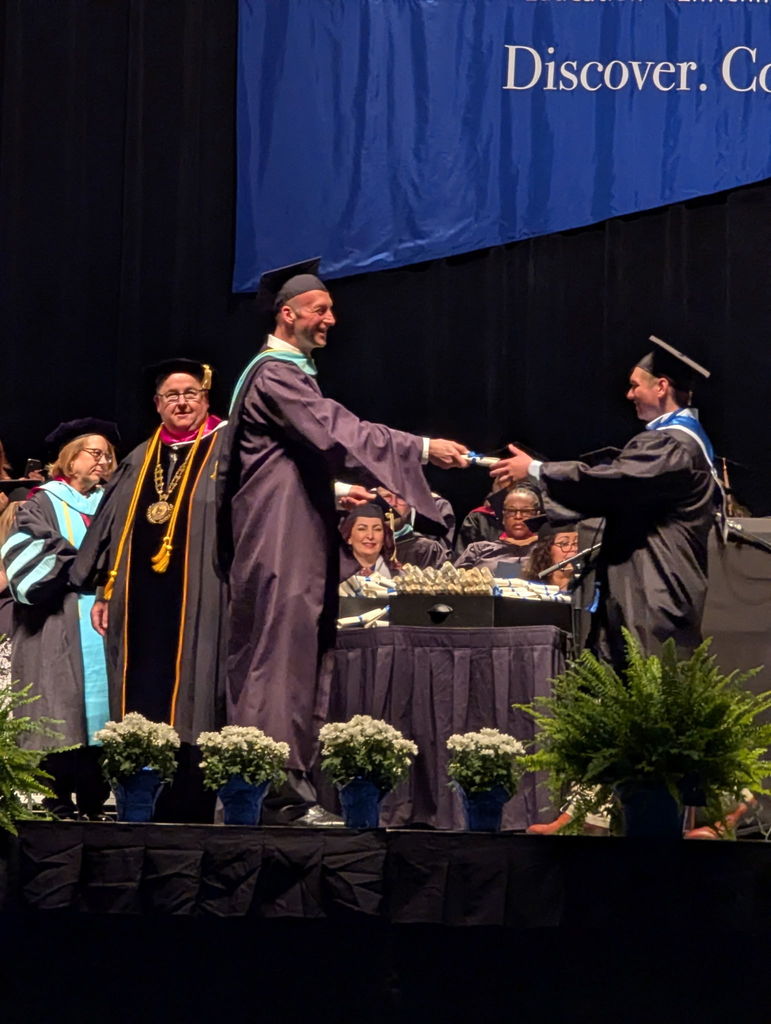 Dylan receiving his diploma
