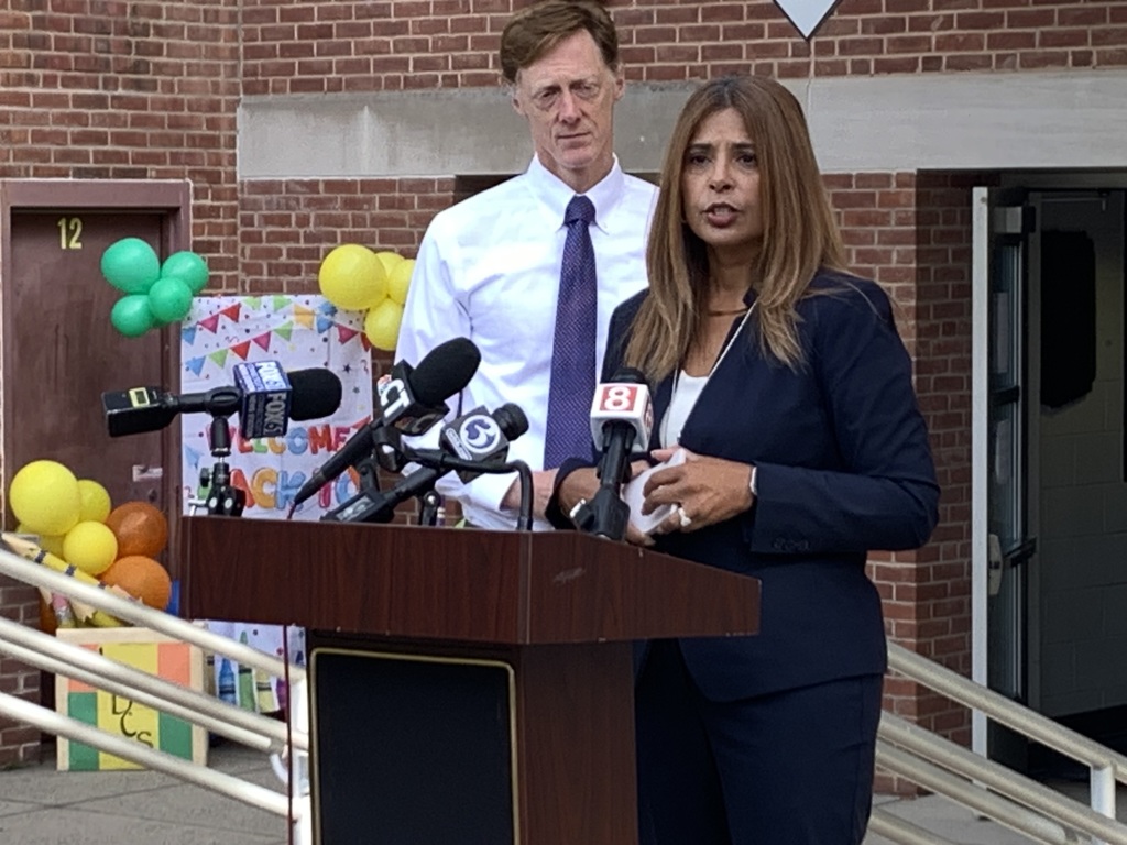 addressing the press