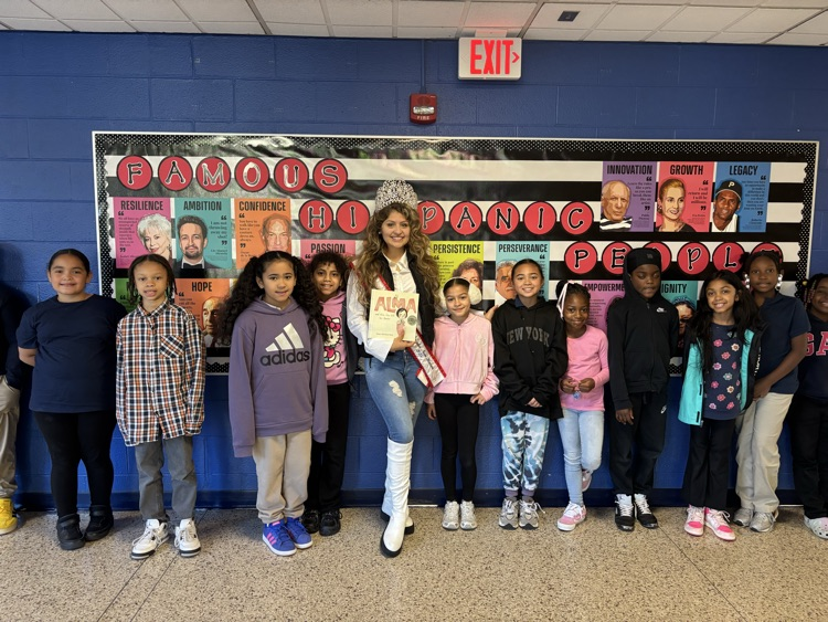 Miss Puerto Rico reads to our 4th grade