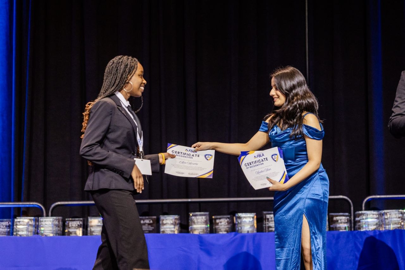 Asia Murphy (left): Receiving Ambassador Award