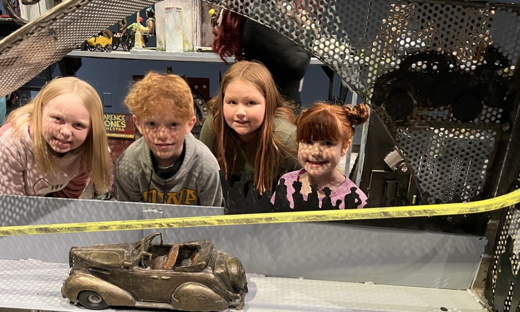 Joyful Resistance Exhibit- admiring the clay sculptures!